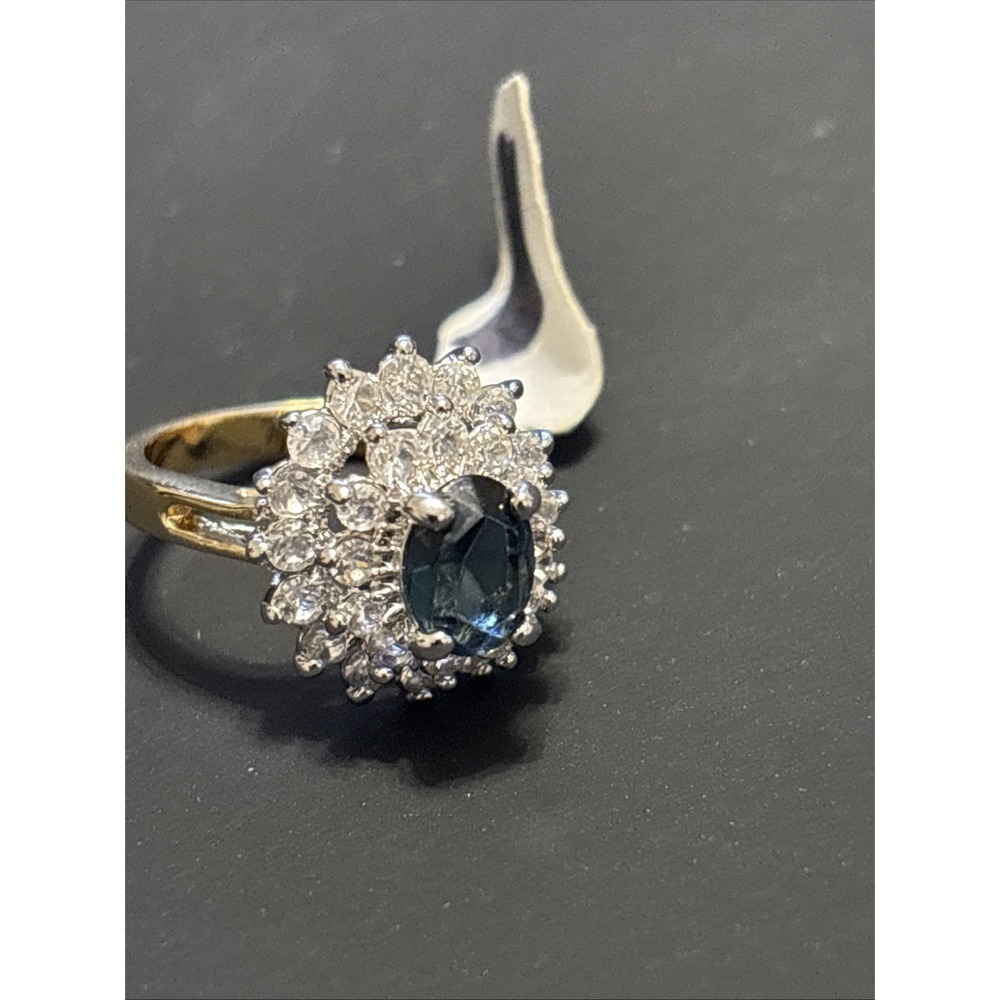 Vintage-Style Gold  Tone Cluster Ring with Oval Blue Center Stone and Halo